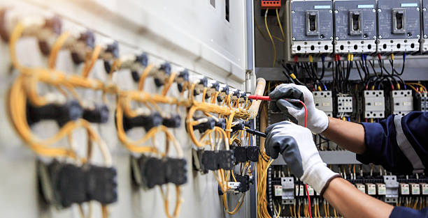 Professional Electrician technician working in Garden City, MO